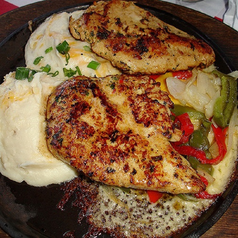 TGI Fridays signature dishes Whiskey-Glazed Burger
Loaded Potato Skins
Sizzling Chicken and Cheese